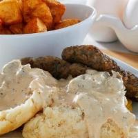 Biscuit & Gravy · House-recipe country sausage over an over-sized biscuit, two eggs any style, and two house-m...
