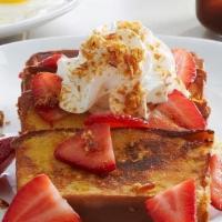 Strawberry Pound Cake French Toast - Vegetarian  · French toast-style pound cake topped with fresh strawberries, fresh whipped cream and crème ...
