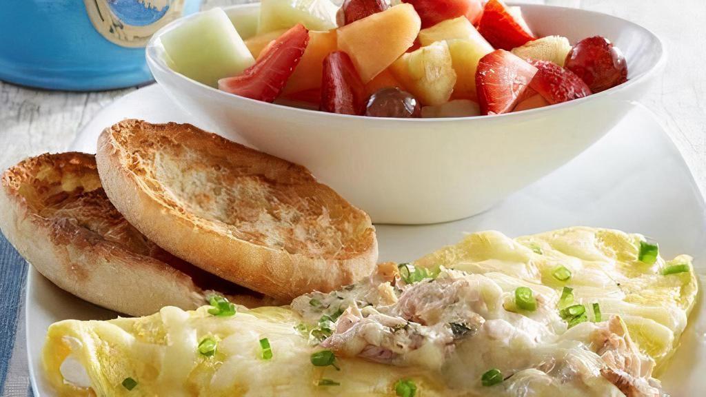 The Floridian™ Omelette - Gluten Friendly · Cream cheese-filled omelette topped with garlic butter sautéed crab meat, Jack cheese and green onions Substitute one slice of gluten friendly bread for the English Muffin. Served with a side of grits.