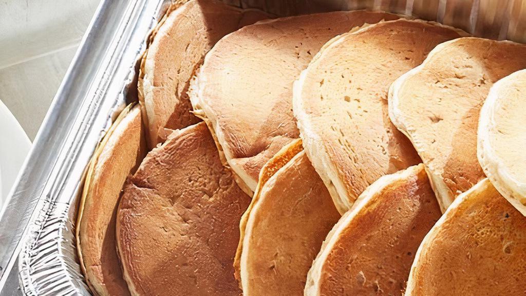 Buttermilk Pancake Platter · 20 house-recipe buttermilk cakes. Served with butter and syrup. (240 cal/serving) Serves 10.