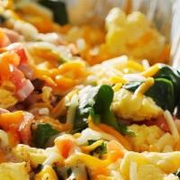 Make It A Scrambler · Scrambled eggs topped with Cheddar Jack cheese. Choose any 3 of the following additions: spi...