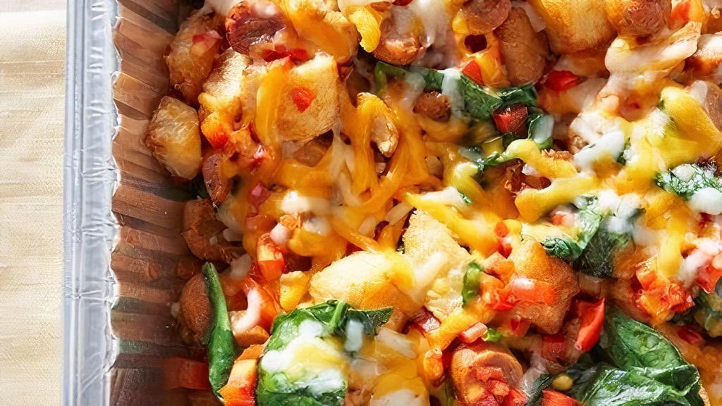 Potato Sensation · Fresh country potatoes topped with Cheddar Jack cheese. Choose any 3 of the following additions: spinach, mushrooms, red peppers, onions, tomatoes, bacon, sausage, maple apple chicken sausage, ham or chorizo. (Serves 10)