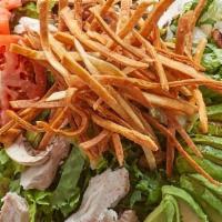 Southwest Chop Salad · Romaine, spinach, turkey, mushrooms, red onion, chopped bacon and black beans. Served with c...