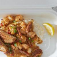 Shrimp & Grits Brunch Box · Gulf shrimp and andouille sautéed with red peppers and onions in a spicy low country reducti...