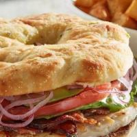 Southern Grilled Chicken Sandwich - Gluten Friendly · Grilled chicken, baked bacon, avocado, lettuce, tomato and pickled red onions with ranch dre...