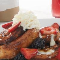 Cinnamon Roll French Toast - Vegetarian Option · Thick-sliced, house-baked French-toast style cinnamon rolls topped with cream cheese icing, ...