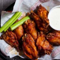 Woody’S Wings 1 Lb · The flavor takes flight slow-smoked wings, tossed in choice of mild, hot, cajun ranch or Dal...