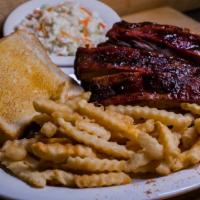 Memphis Style Spare Ribs · Enjoy these tender, slow-smoked ribs hand-rubbed with award-winning seasoning. All dinners i...
