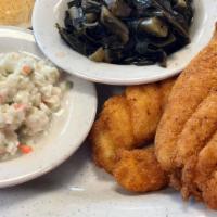 Southern Fried Catfish · A true Southern favorite! Our Louisiana catfish is lightly breaded, fried and served with yo...