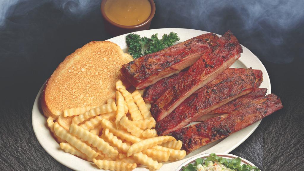 Smokin’ Spare Ribs · All dinners include garlic toast and your choice of two creamy coleslaw, french fries, baked or sweet potato, country vegetables, mashed potatoes, and gravy or bbq beans.