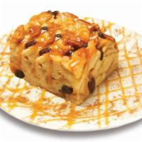 Bread Pudding · A Southern classic featuring warm, bread pudding drizzled with caramel sauce.