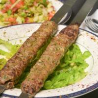 Kebab · Ground beef and lamb served with three side choices.