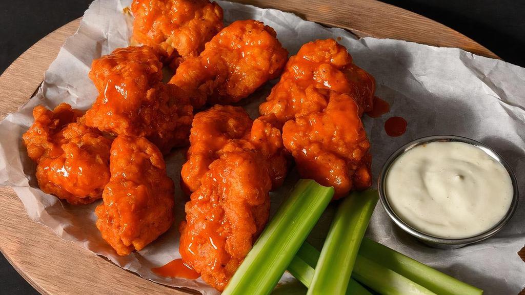 10 Boneless Wings · 10 Deep fried boneless chicken wings seasoned with our signature seasoning blend, served with your choice of our signature wing sauces or dry rubs.. Wing orders include a side of celery and choice of ranch or bleu cheese.