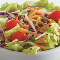 Side House Salad · A bed of lettuce topped with grape tomatoes, shredded carrots, shredded cabbage, and mozzare...