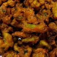 Gobi 65 Sorcery · Cauliflower marinated with garlic & ginger; then stir-fried and slightly sauteed with green ...