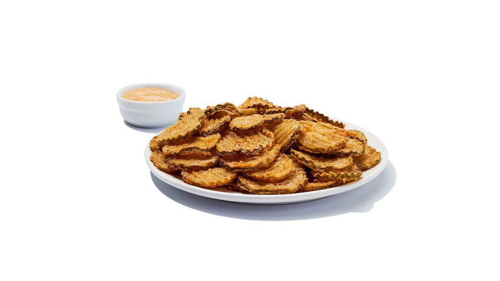 Fried Pickles · Lightly breaded sliced pickles served with dipping sauce