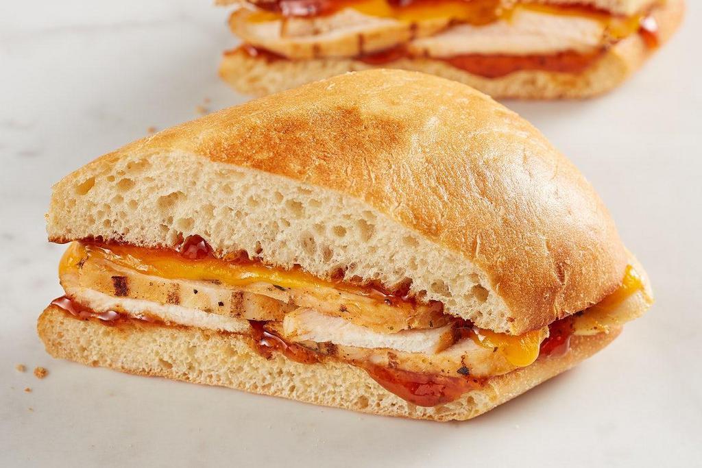 Sweet Chipotle Chicken · Grilled chicken, sharp cheddar and spicy sweet chipotle peach sauce on toasted ciabatta