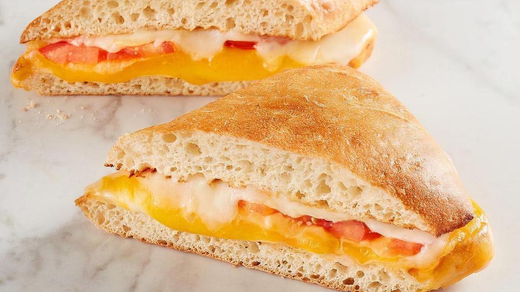 Four Cheese Melt · Provolone, Swiss, American, Parmesan and Tomato on Toasted Ciabatta.