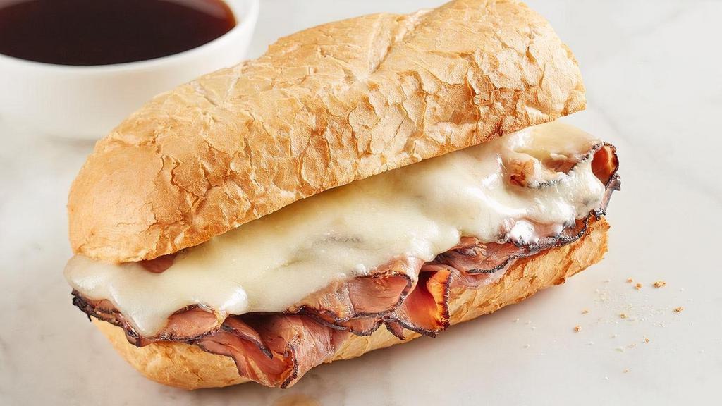 French Dip · Black Angus roast beef and swiss on a baguette, served au jus.
