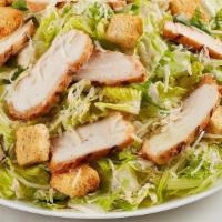 Grilled Chicken Caesar · Parmesan, croutons and Caesar dressing on romaine lettuce with Grilled Chicken.