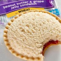 Smucker’S® Uncrustables® Pb&J · Grape jelly and peanut butter on crust-less wheat bread. Comes with your choice of a side an...
