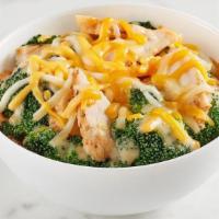 Kids Chicken & Broccoli Bowl · All natural chicken tossed with steamed broccoli, cheddar-jack cheese, and Broccoli & Chedda...