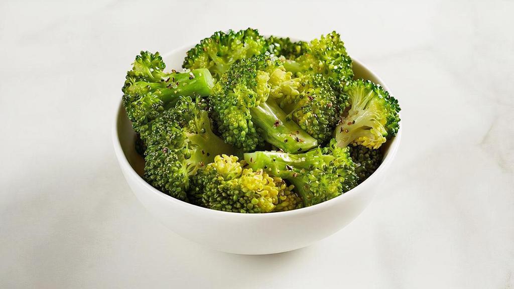 Steamed Broccoli · Lightly seasoned steamed broccoli