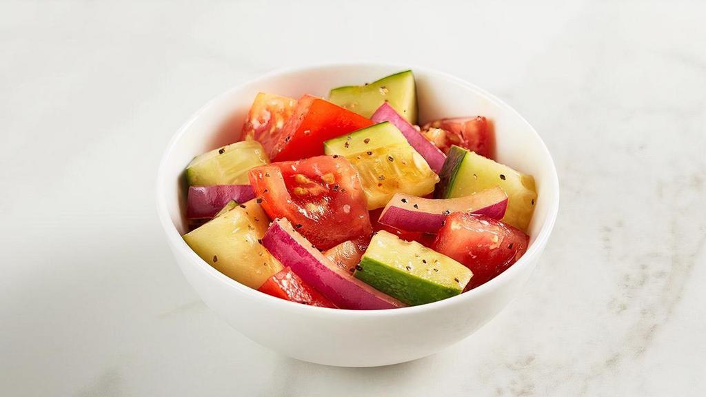 Tomato & Cucumber Salad · A blend of tomatoes and cucumbers with sliced red onions and mixed with balsamic vinaigrette