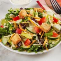 Side Garden Salad · A light bite made with a bed of lettuce, tomatoes, cucumbers, cheddar-jack cheese and your c...