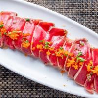 Tuna Tataki · Raw. Seared tuna with ponzu sauce, topped with fish egg & scallion. Consuming raw or underco...