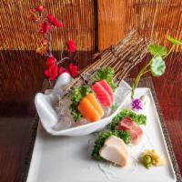 Sashimi Appetizer · Raw. Eight pieces of assorted sashimi. Consuming raw or undercooked meat, poultry, seafood, ...