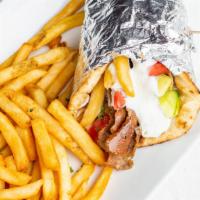 Gyro Pita · Seasoned beef & lamb meat with tzatziki, tomatoes, onions, and cucumbers.