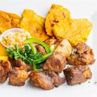 Fried Cubes Of Pork (Griot) · perfectly seasoned and fried pork
shoulder chunks.