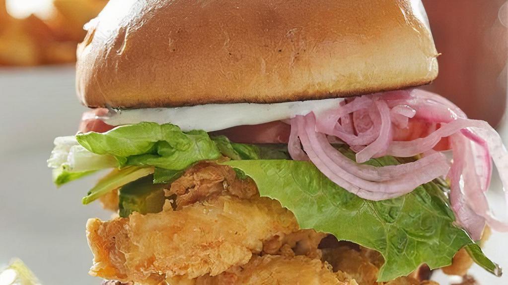 Southern Chicken Sandwich · Choice of grilled or fried chicken, baked bacon, avocado, lettuce, tomato and pickled red onions with ranch dressing on a brioche bun.