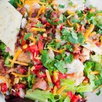 Santa Fe Salad · Mixed greens, grilled chicken, black bean corn salsa, bacon, cheddar, cilantro, and chipotle...