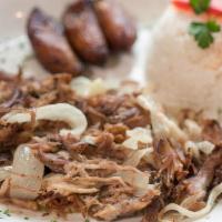 Roast Pork · Traditionally our national dish marinated in tasty tropical spices and mojo juice. Oven roas...