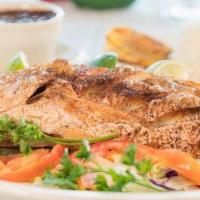 Whole Red Snapper · Served with white rice, black beans and sweet plantains.