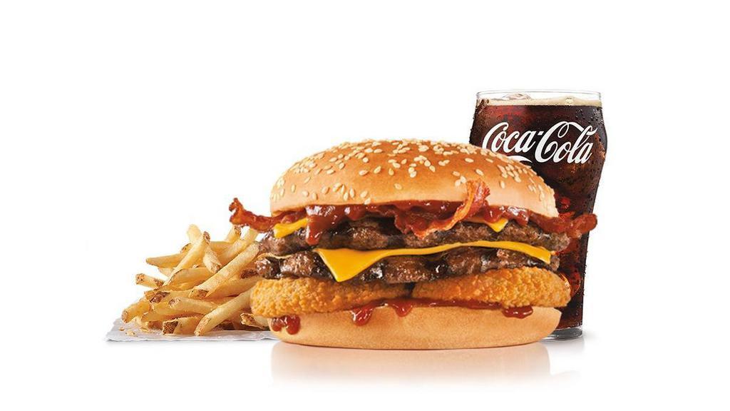 Double Western Bacon Cheeseburger® Combo · Two charbroiled all-beef patty, two strips of bacon,  American cheese, two crispy onion rings and tangy BBQ sauce on a seeded bun. Served with Fries and a Soft Drink.