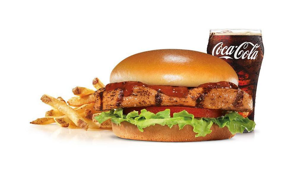 Bbq Grilled Chicken Combo · A charbroiled chicken breast, BBQ Sauce, tomato and lettuce, served on a potato bun. Served with Fries and a Soft Drink.