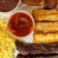 Bistec Criollo A Caballo · 2 Eggs, Steak With Creole Sauce, Fried Cheese.