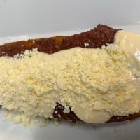 Maduro Relleno ( Frijol Molido, Crema & Queso) · Stuffed Sweet Plantain with mashed beans, cream & crumbled cheese.