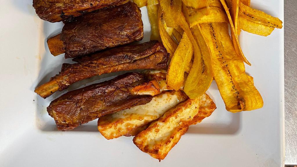 Pork Ribs Served With Fried Cheese & Plantain Chips · 