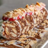 Marquesa Roll · CHOCOLATE MILK, NUTELLA, STARWBERRIES, MARIA CRACKERS, CONDENSED MILD, AND SHAVED ALMONDS