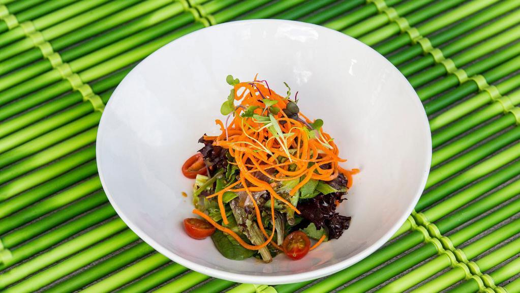 Ginger Salad · SPRING MIX GREENS, SESAME SEEDS, CHERRY TOMATOES, CARROTS AND GINGER DRESSING