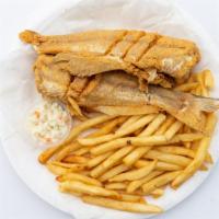 Whole Catfish Dinner · A choice  of 1 pc, 2 pcs or 3 pcs, coleslaw and fries,