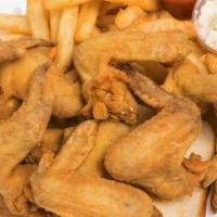 100 Wings · 100 pcs antibiotic and hormone free all natural Whole Wings only no fries.