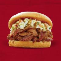 Sweet Carolina Sandwich® · Pulled Pork topped with homemade coleslaw and Sonny's Signature Carolina Sauce on a bun.