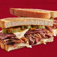 Sonny’S Cuban™ Sandwich · Our slow-smoked Pork, pulled and sliced with Swiss cheese, pickles and our Mustard BBQ Sauce...