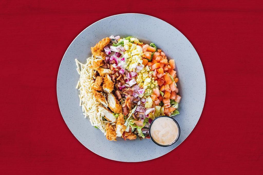 Bbq Cobb Salad · Mixed greens, hard-boiled eggs, chopped bacon bits, diced tomato, red onion and shredded Pepper Jack cheese served with Smokin’ Ranch dressing. Add your favorite BBQ meat for a little bit more..