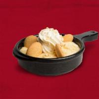 Homestyle Banana Pudding · Fresh banana slices and our signature pudding topped with vanilla wafers and whipped cream.